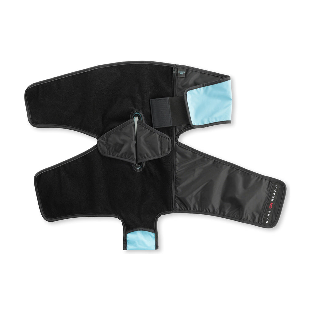 The black articulated knee cover opened flat on white, fleece face up, showing the centre zip, the patella opening and the hook-and-loop closure strap.