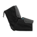The flexed elbow sleeve on white in profile, fleece face out, showing the elbow bend and both nylon cuff flaps.