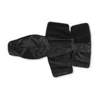 A black hand and wrist sleeve opened flat on white, forearm channel at left and the hand and thumb sections spread at right.