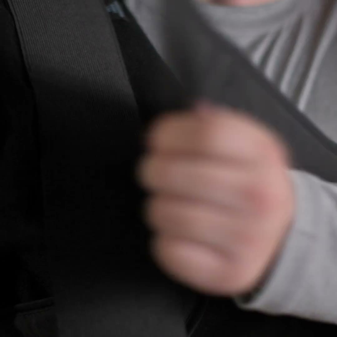 Game Ready Shoulder Wrap being positioned on a model, studio white background.